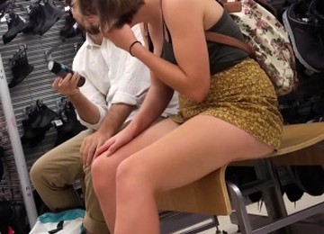 Brunette Is Trying On Shoes And Gives A Good Upskirt Shot O