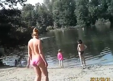 Sunny Day At The Nudist Camp By The River