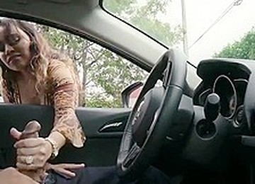 Busty Latina Gives A Guy Handjob Through Car Window In Public