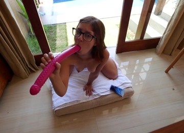 Cute Babe Fucks Her Ass With Big Rose Dildo Near Window For Everyone To See