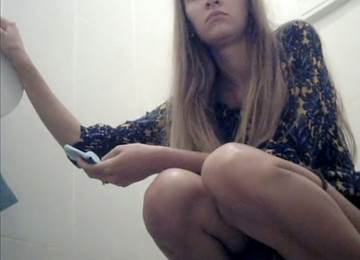 Long Haired Hot Blonde Girl Pisses In The Toilet Room