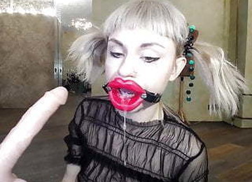 Russian Girl Fucks Herself In The Throat With A Rubber Dick