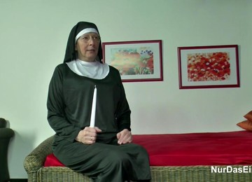 German Nun With Priest In Church