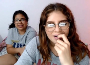Two Nerdy Latinas Playing With Their Pussies On Cam