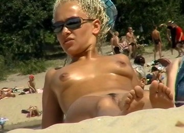 Hot Naked Women Are Filmed On A Nudist Beach On Cam