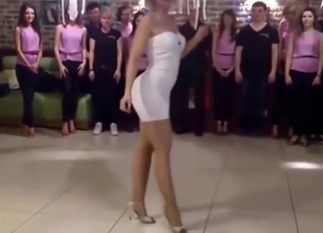 Woman In Sexy Short Dress Is Dancing On Family Party