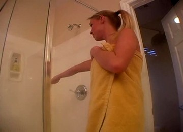 Watch This Video To See This Busty Blonde Masturbating In The Shower