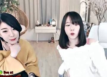 Korean Teen Lesbians Show Their Big Tits