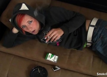 Punk Chick In A Flirty Hoodie Smokes A Cigarette