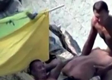 Couple Of Sluts On The Beach Caught Having A Threesome On Hidden Voyeur Cam